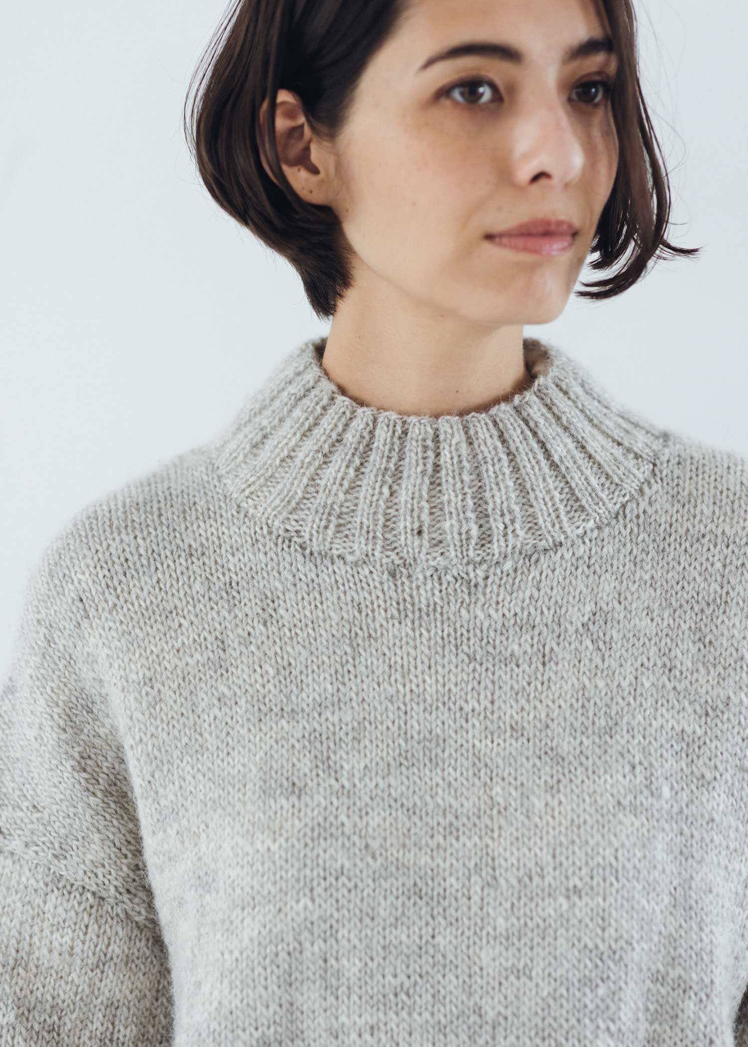 手編み花柄ジャカードハイネックプルオーバー