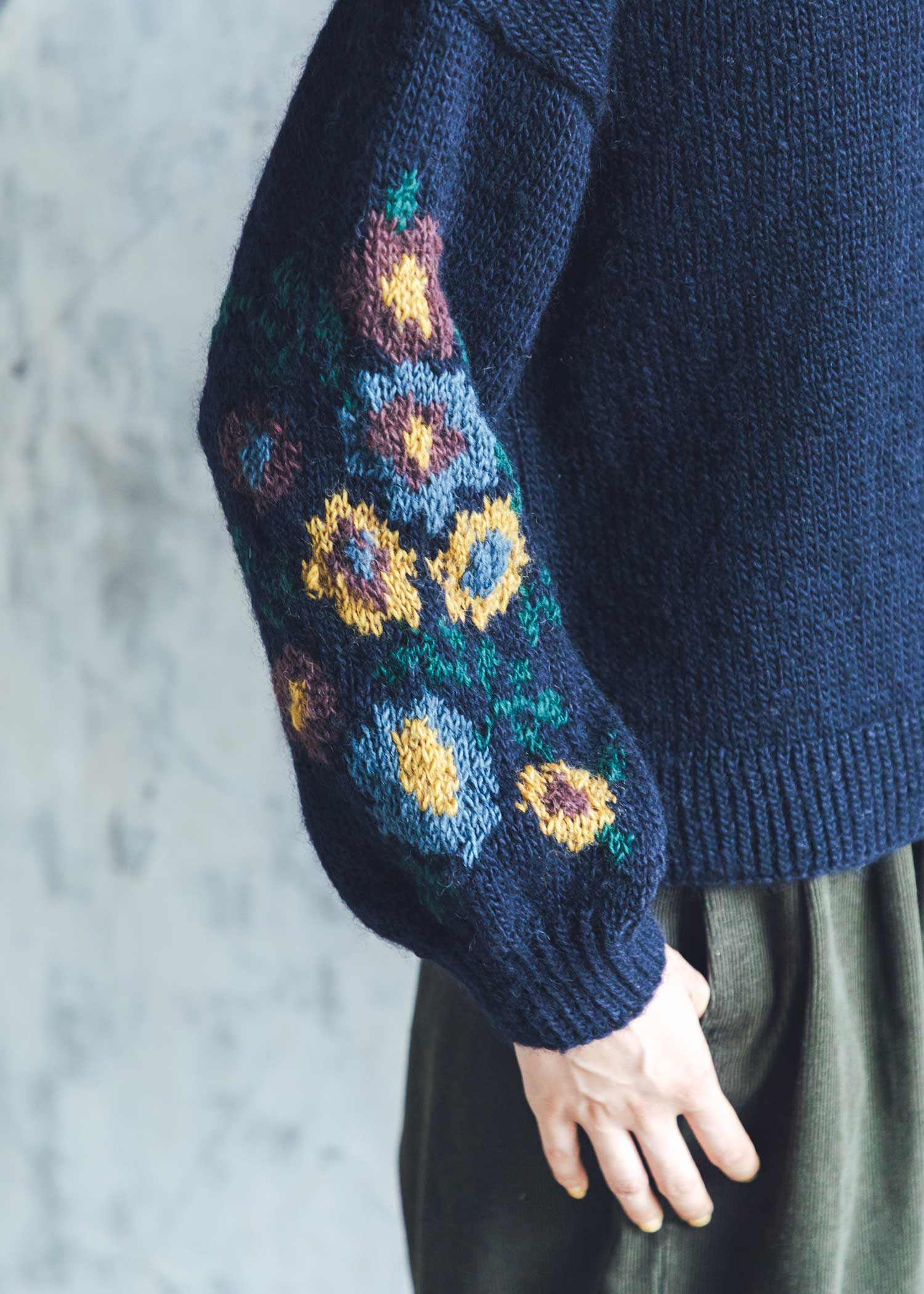 手編み花柄ジャカードハイネックプルオーバー