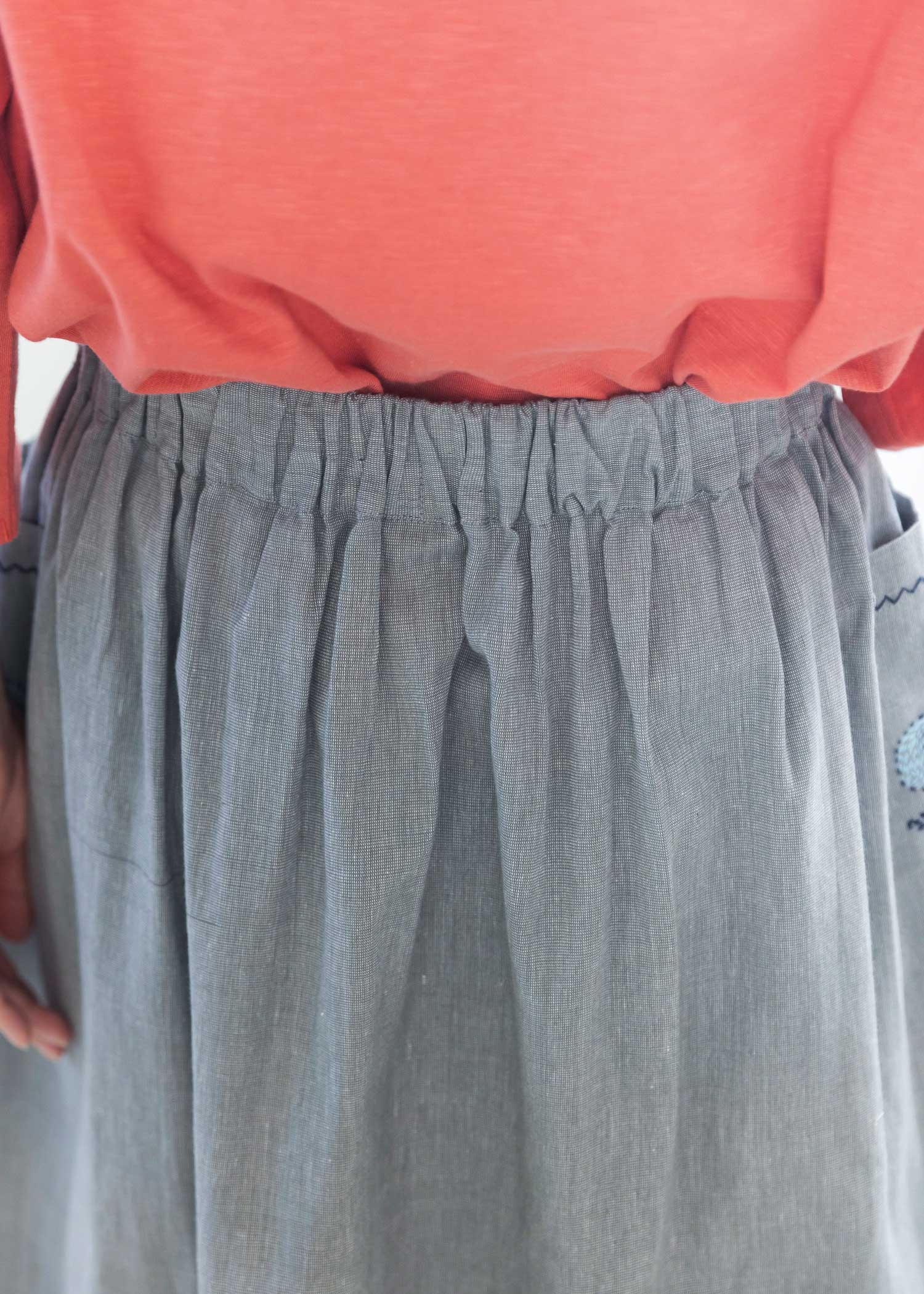 手織りブルーベル刺繍サイドポケットタックスカート